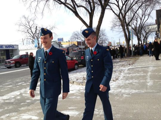 Two Auxiliary Cadets preparing for the start of Transcona's Remembrance Day Parade.