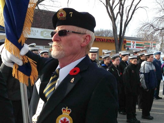 A member of the Color Party waits for the Remembrance Day Parade to begin.